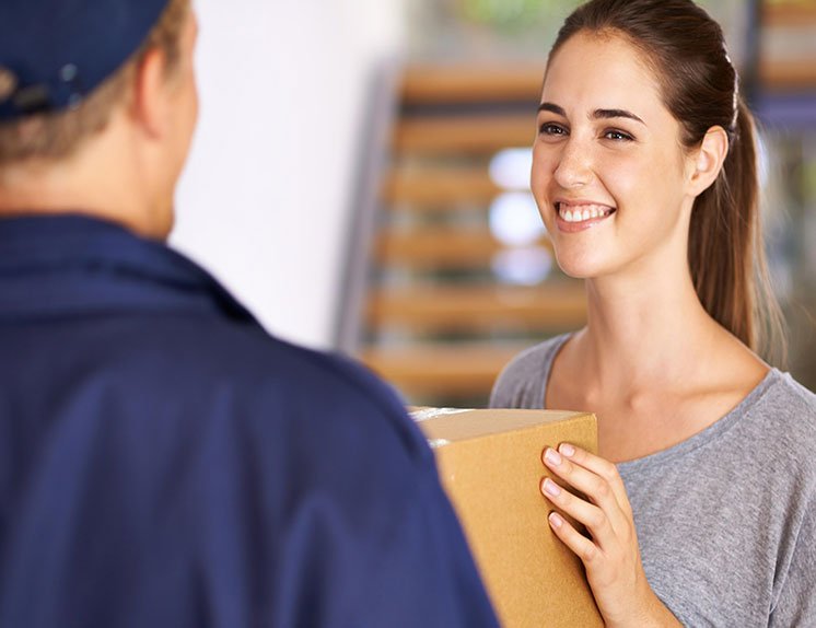 A woman receiving a package