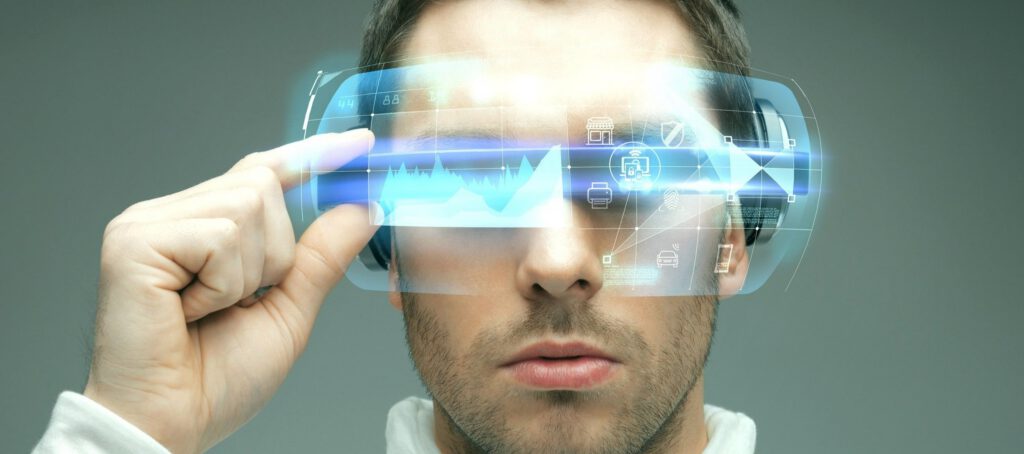 a man using glasses with a hologram projection