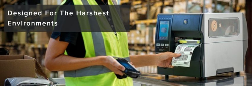 A banner saying 'Designed for the harshest environments' with someone using a printer in a warehouse