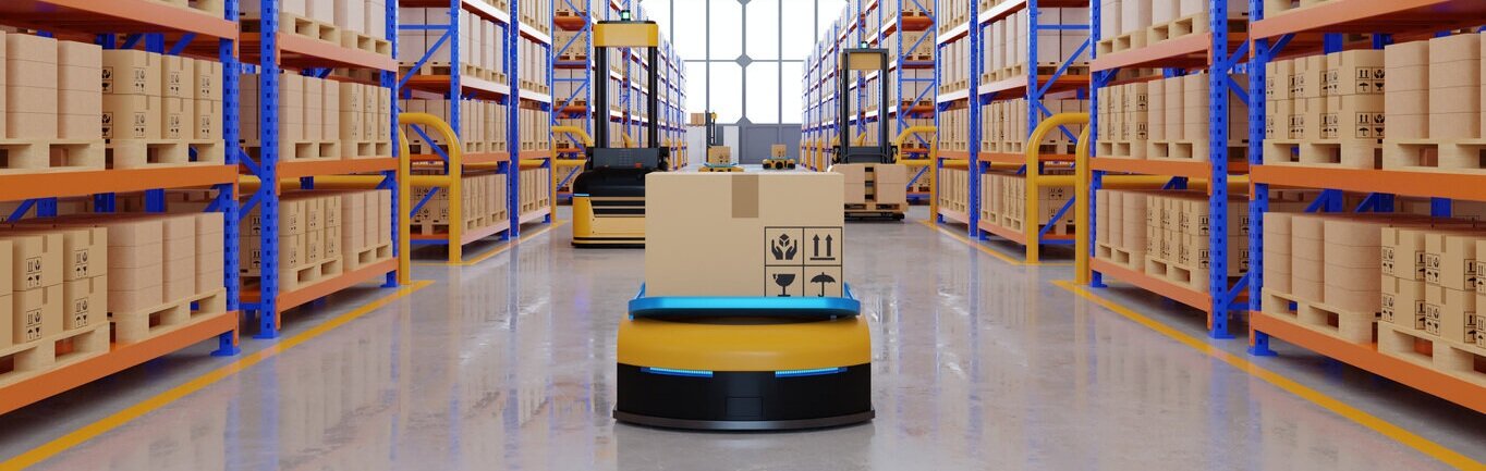 Robots on a warehouse floor transporting packages