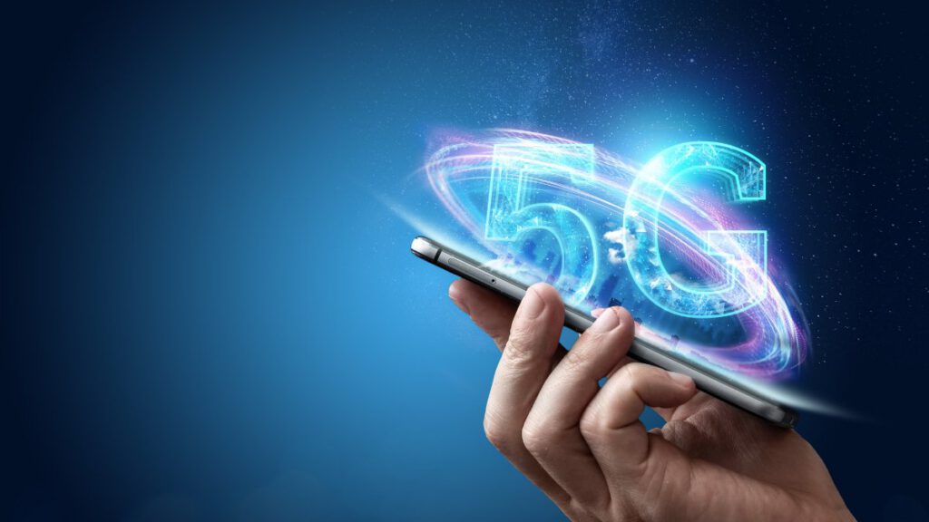 A mobile computer with a 5G symbol over it