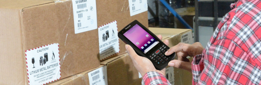 Someone using a Honeywell mobile barcode scanner