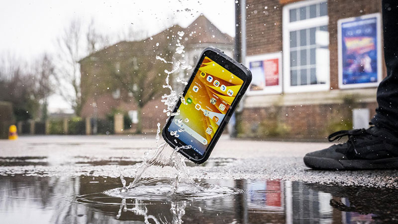 A mobile phone falling on the ground.
