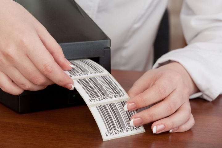 Someone using a barcode printer