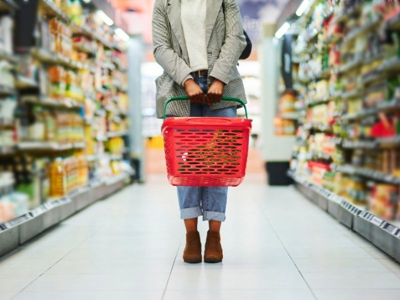 A woman standing in a retail store