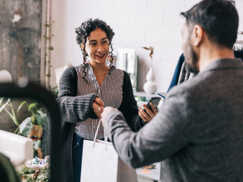 A retail worker and customer