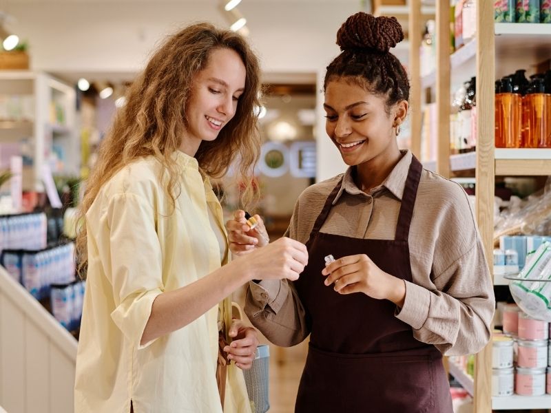 A retail worker and customer